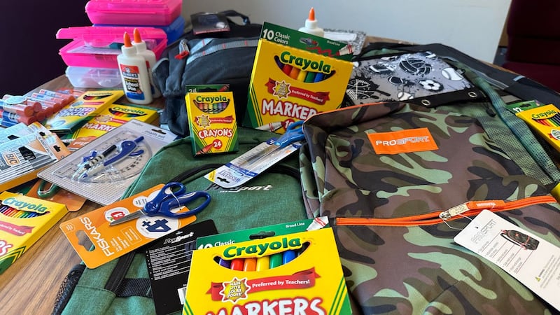 These are just some of the many school supplies in the backpack given to families.